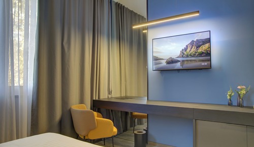 Habitación estándar con 1 cama doble o 2 individuales, vistas a la ciudad