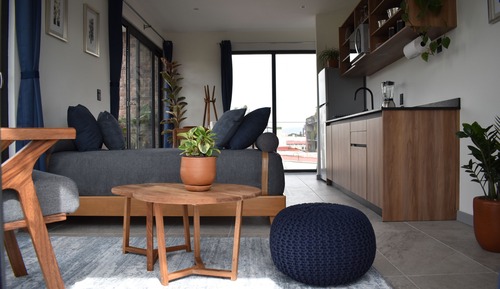 Suite exclusiva, 1 cama de matrimonio con sofá cama, vistas a la ciudad, en esquina