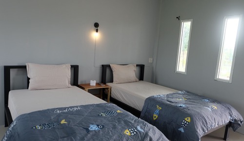 Habitación superior, varias camas