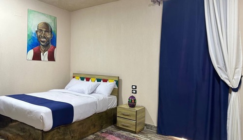 Habitación junior con 1 cama doble o 2 individuales