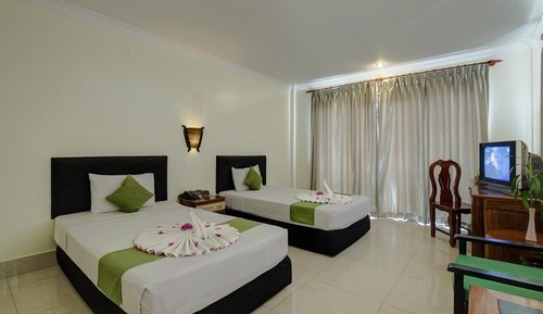 Habitación Deluxe con 1 cama doble o 2 individuales, 2 camas individuales, vistas a la ciudad