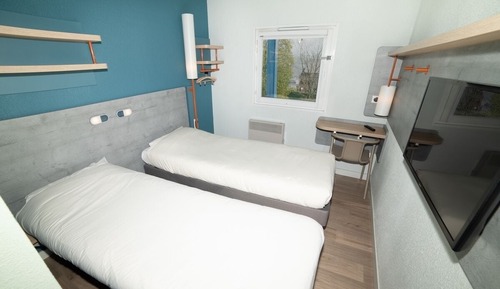 Habitación Business con 1 cama doble o 2 individuales