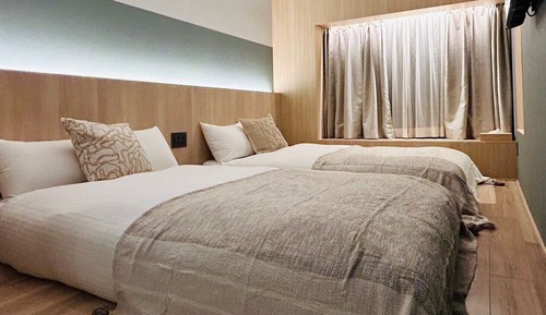 Habitación con 2 camas individuales