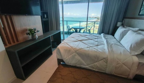 Habitación triple superior, varias camas, vistas al mar