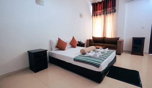 Habitación estándar con 1 cama doble o 2 individuales