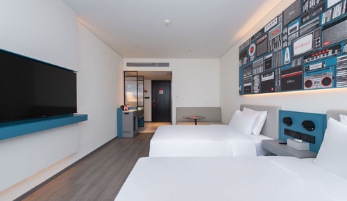 Habitación Business con 1 cama doble o 2 individuales