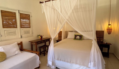 Suite superior, varias camas, vistas al patio