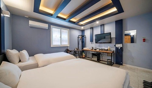 Habitación con 2 camas individuales