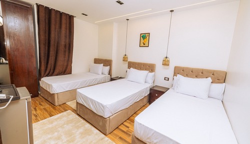 Habitación triple Deluxe
