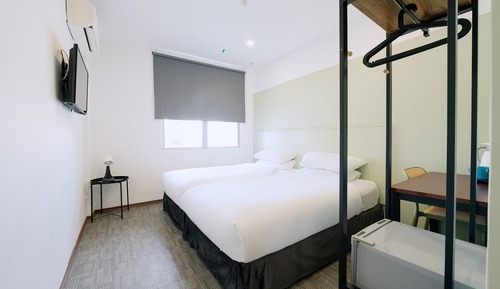 Habitación con 2 camas individuales