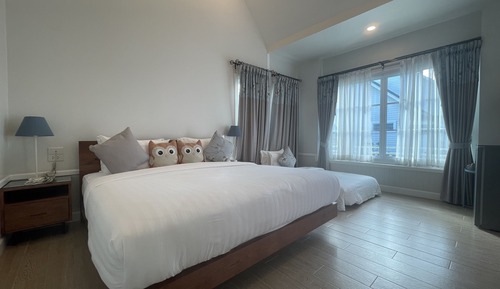Habitación triple Deluxe, balcón