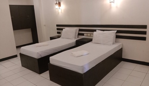 Habitación con 2 camas individuales