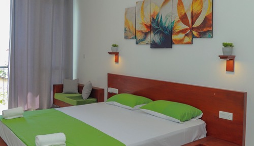 Habitación triple Deluxe
