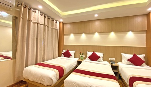 Habitación triple Deluxe
