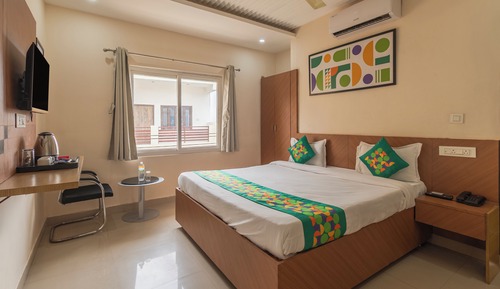 Habitación estándar con 1 cama doble o 2 individuales, balcón