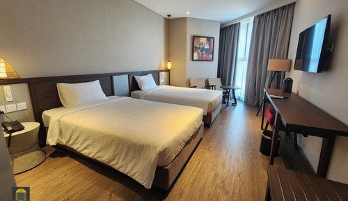 Habitación Deluxe con 2 camas individuales, vistas al jardín