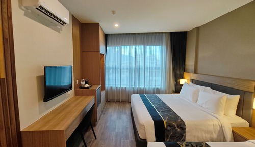 Habitación triple Deluxe