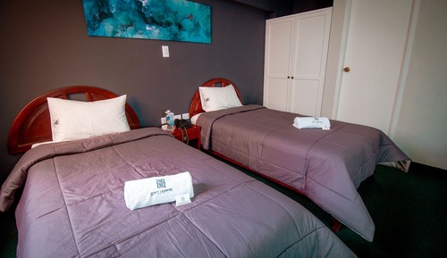 Habitación tradicional con 2 camas individuales