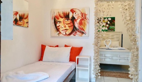 Habitación triple, varias camas