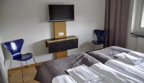 Habitación con 2 camas individuales, baño privado