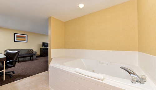 Suite, 1 cama de matrimonio grande con sofá cama, bañera de hidromasaje