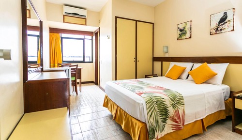 Habitación ejecutiva con 1 cama doble o 2 individuales, vistas al mar, mirando al mar