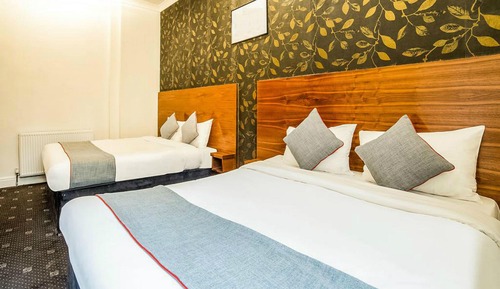 Habitación cuádruple Deluxe