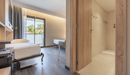 Habitación triple, varias camas, vistas a la ciudad
