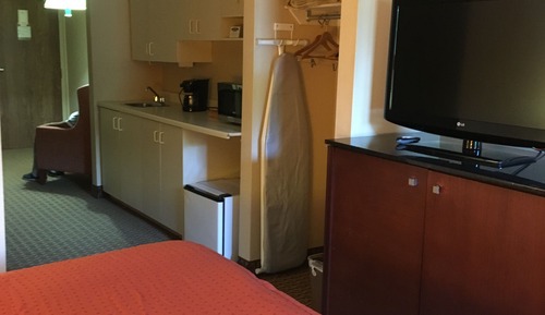 Suite ejecutiva, 1 cama de matrimonio con sofá cama, cocina básica