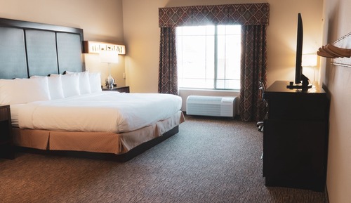 Suite estudio Deluxe, 1 cama de matrimonio grande con sofá cama, bañera de hidromasaje, en esquina