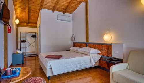 Habitación estándar con 1 cama doble o 2 individuales
