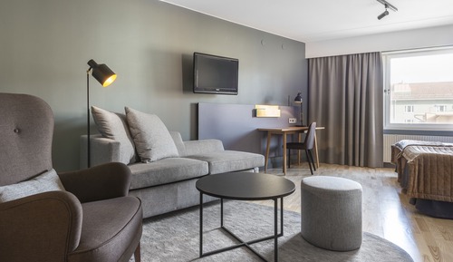 Habitación superior con 2 camas individuales, varias camas