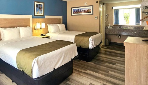 Two Queen Beds, Suite Non Smoking with 1 Person Sofa Bed
