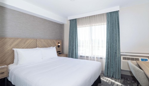 Suite estándar, 1 cama de matrimonio grande con sofá cama (Wet Bar)