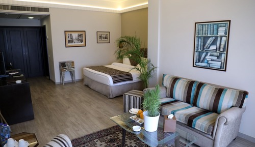 Suite junior, 1 cama de matrimonio grande, vistas parciales al mar
