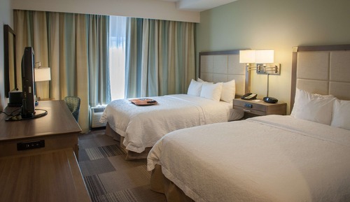 Two queen beds with accessible tub