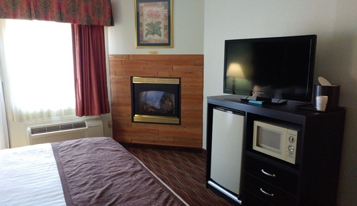 Suite, 1 cama de matrimonio grande, no fumadores, balcón (Jetted Tub, Fireplace)