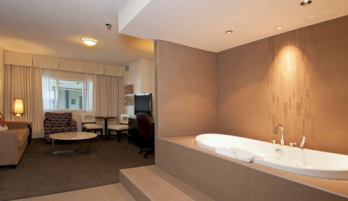Estudio Premium, 1 cama de matrimonio grande, bañera de hidromasaje (Coast Honeymoon Suite)