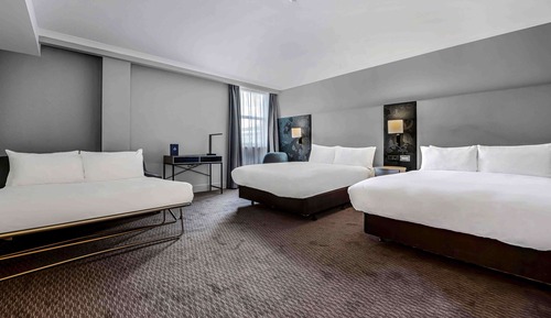 Habitación Deluxe, varias camas