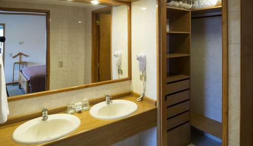 Habitación triple, vistas al mar