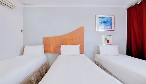Habitación triple estándar, varias camas