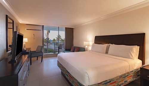 Habitación, vistas parciales al mar