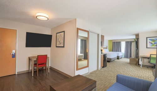 Suite, 2 camas de matrimonio (with Additional Living Area)