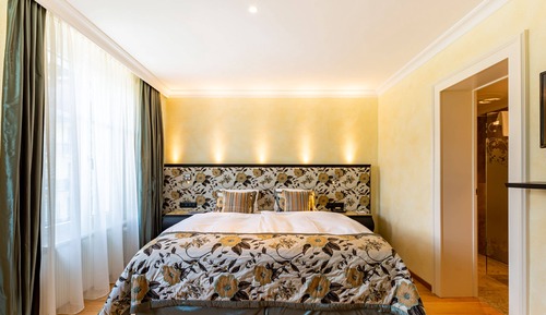 Habitación junior con 1 cama doble o 2 individuales (Deluxe)