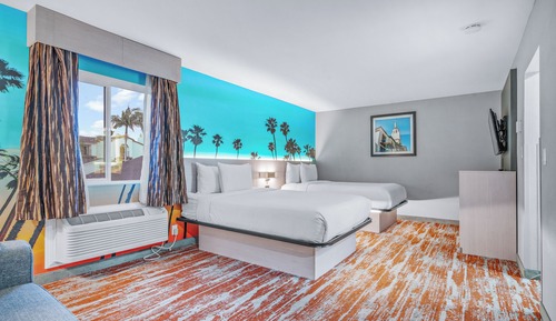 Habitación Deluxe, varias camas (Deluxe Queen Suite)