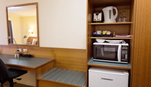 Habitación triple Deluxe, varias camas, bañera de hidromasaje