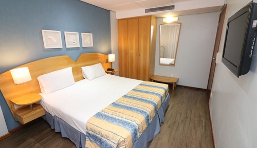 Habitación triple ejecutiva, varias camas