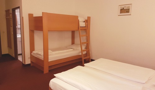Habitación familiar, varias camas