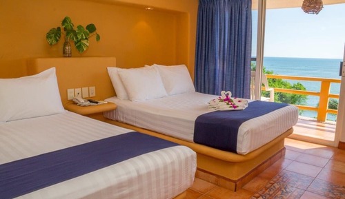 Habitación estándar, 2 camas dobles, vistas al mar
