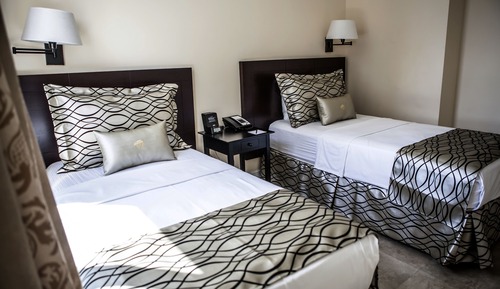 Habitación superior, varias camas